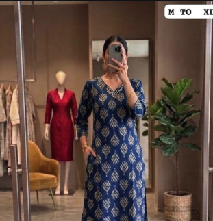 Model wearing a blue printed kurthi